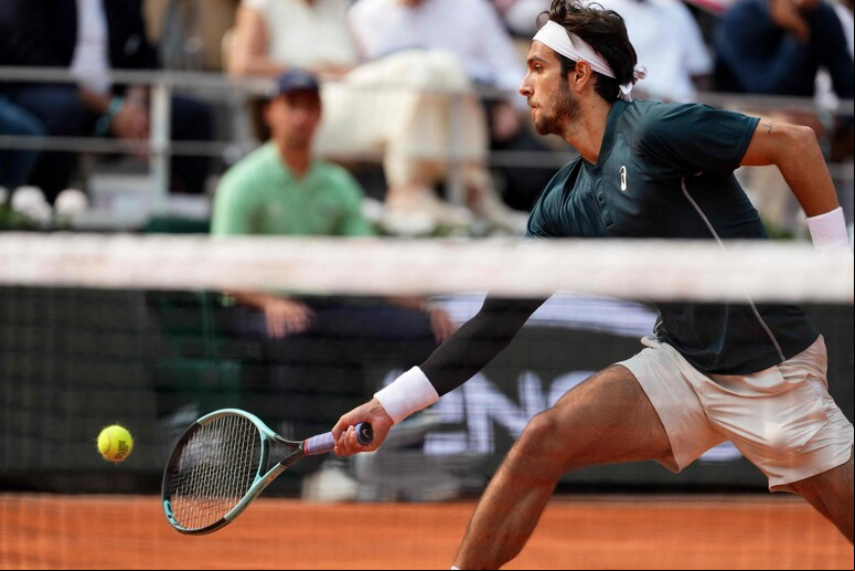 Lorenzo Musetti disputará sua primeira semifinal em Roland Garros © ANSA/AFP